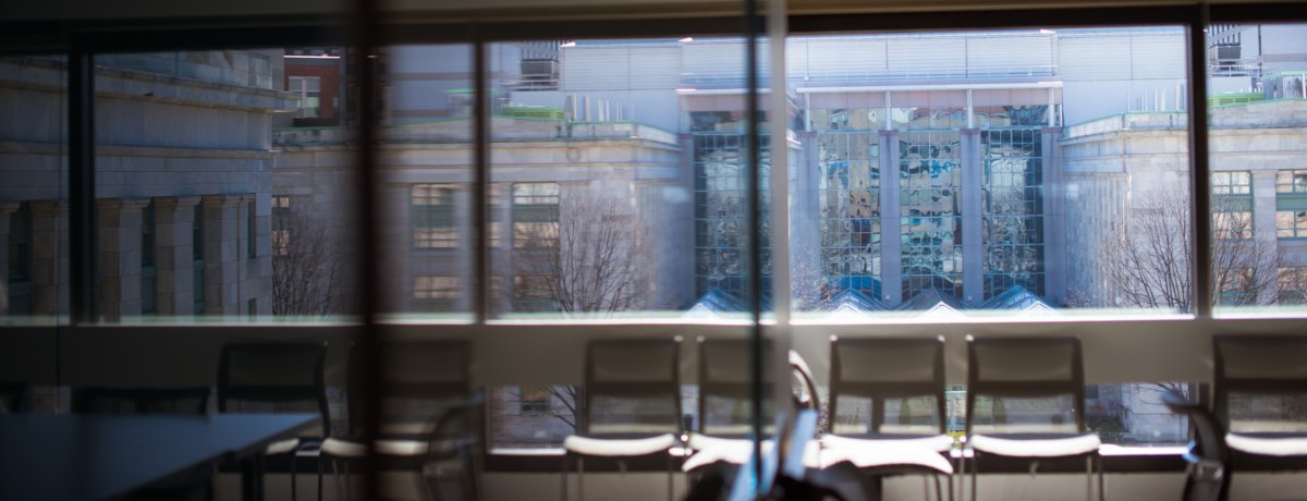 Cell Biology conference room with reflection and view of the Harvard Medical School Quad.